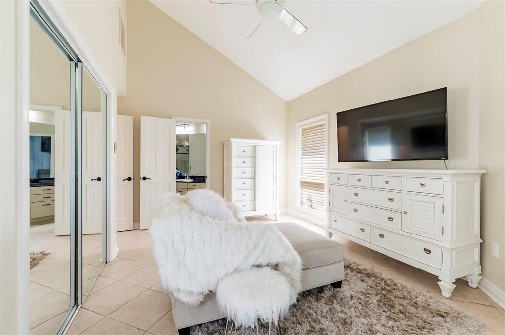 2268 Kings Point Drive Largo, FL 33774 - Photo 25 of 84 a living room with furniture and a flat screen tv