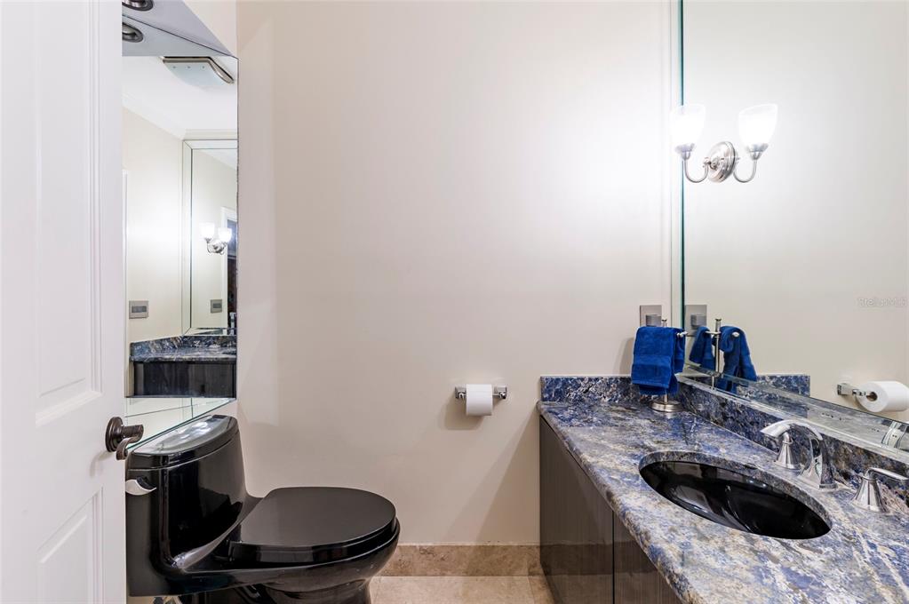 2268 Kings Point Drive Largo, FL 33774 - Photo 28 of 84 a kitchen with a sink and a stove