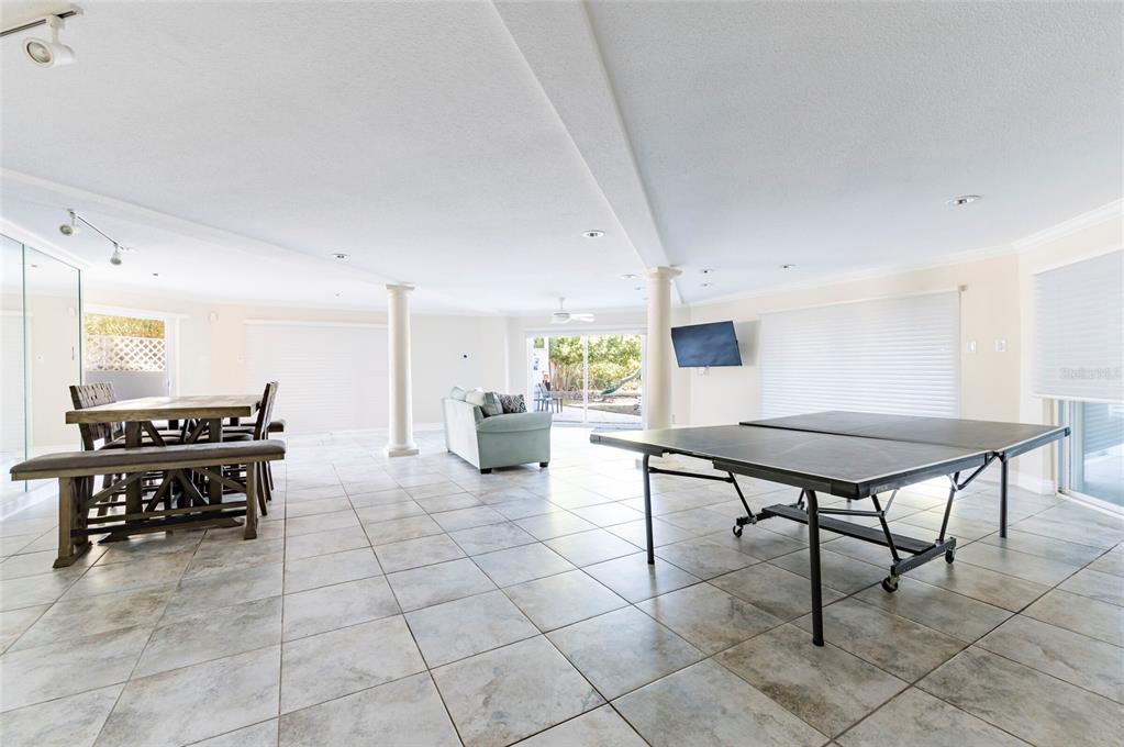 2268 Kings Point Drive Largo, FL 33774 - Photo 47 of 84 a view of a chairs and table in a room