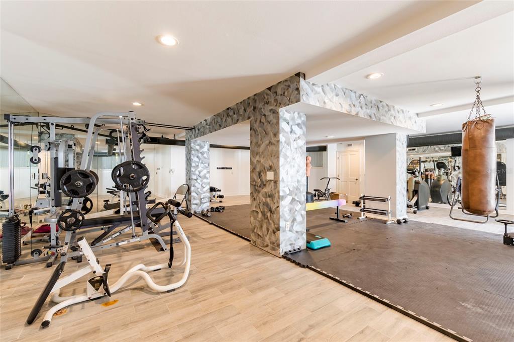2268 Kings Point Drive Largo, FL 33774 - Photo 56 of 84 a view of a room with gym equipment
