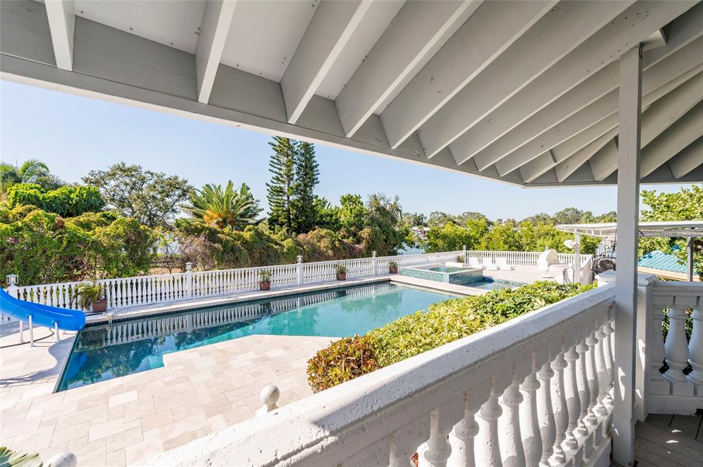 2268 Kings Point Drive Largo, FL 33774 - Photo 64 of 84 a view of swimming pool with outdoor seating