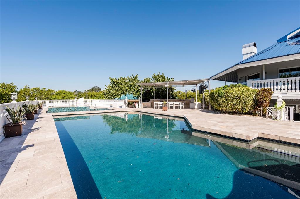 2268 Kings Point Drive Largo, FL 33774 - Photo 67 of 84 a view of a swimming pool with a patio