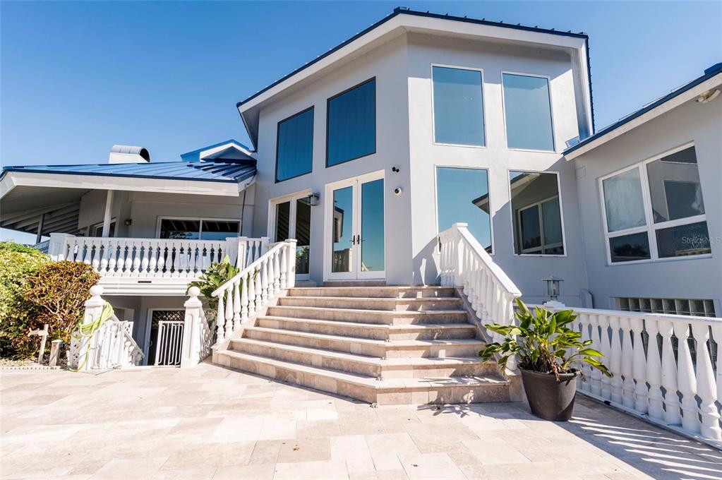 2268 Kings Point Drive Largo, FL 33774 - Photo 68 of 84 a front view of a house with a porch