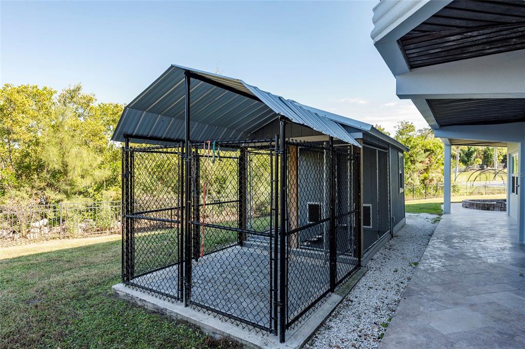 2268 Kings Point Drive Largo, FL 33774 - Photo 83 of 84 a view of a porch with wooden floor and roof
