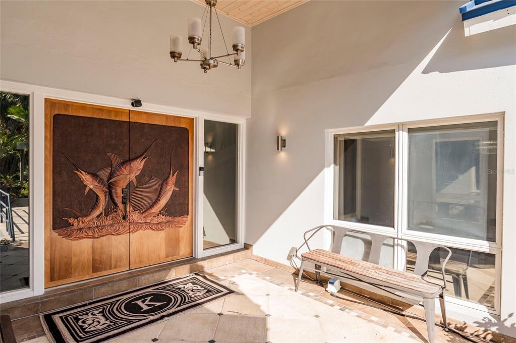 2268 Kings Point Drive Largo, FL 33774 - Photo 10 of 84 a view of a car park in front of a house