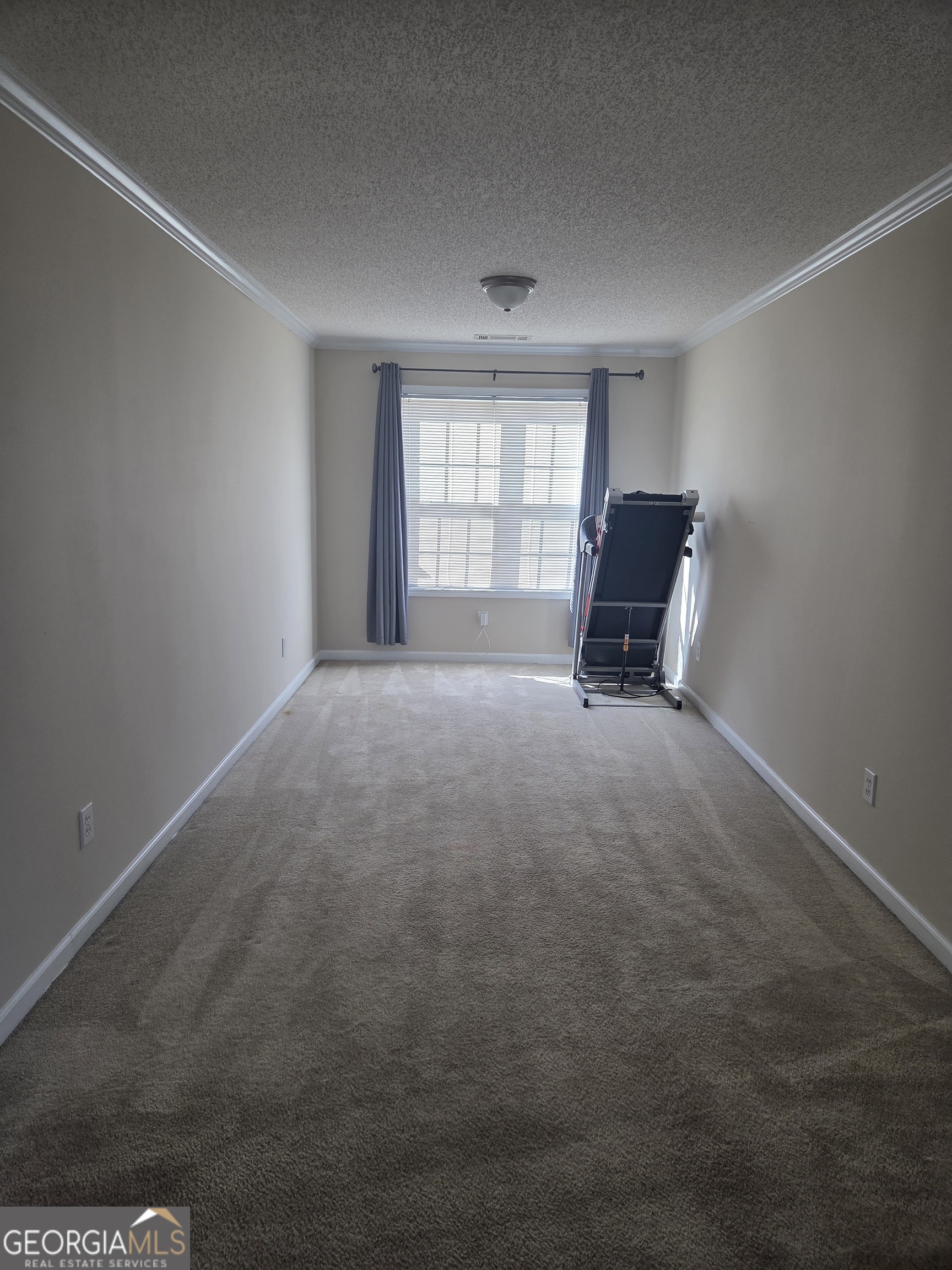 130 Stephanie Lane Covington, GA 30016 - Photo 15 of 67 a bed room with a bed and a window