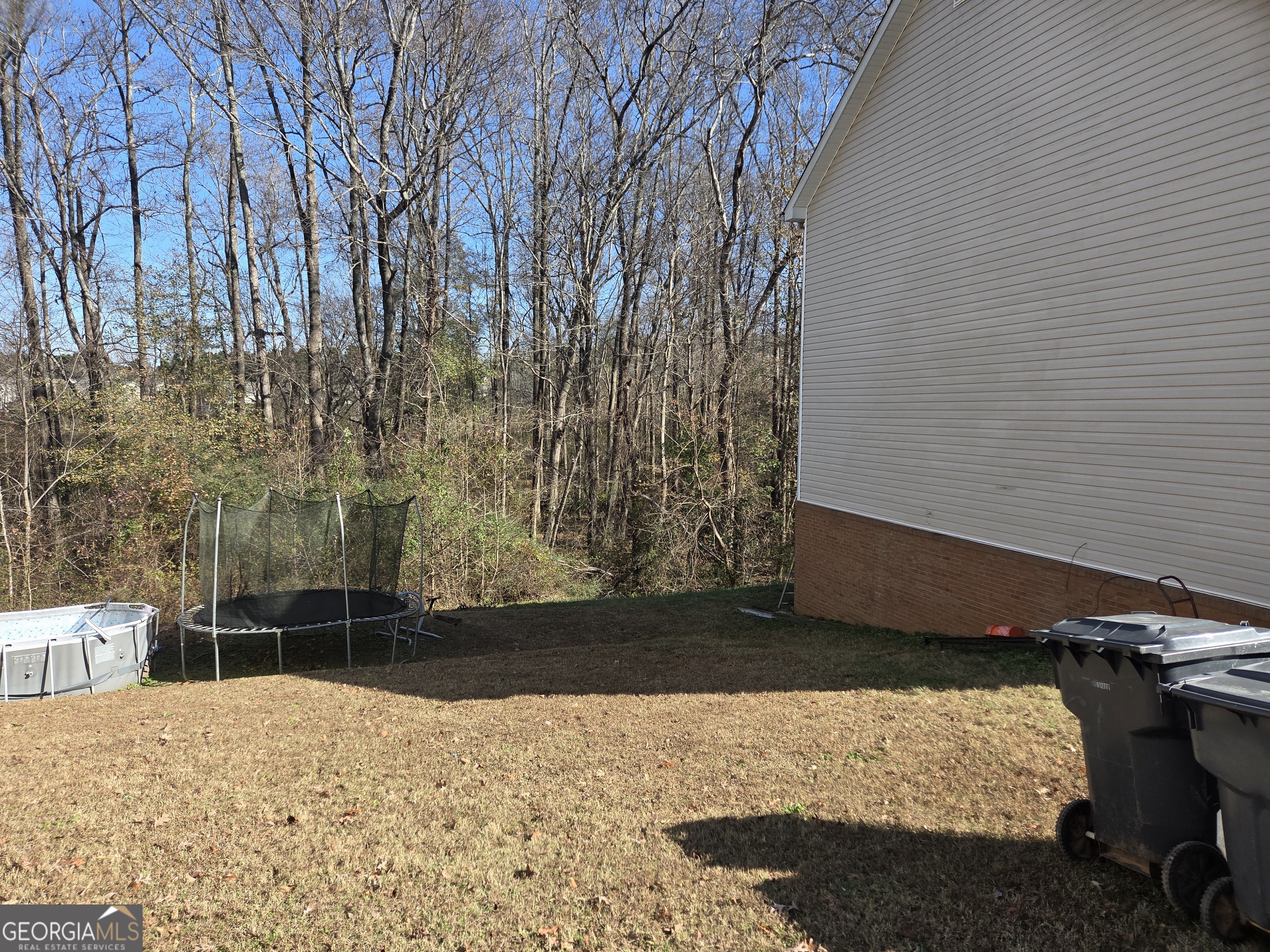 130 Stephanie Lane Covington, GA 30016 - Photo 25 of 67 a view of a backyard of a house