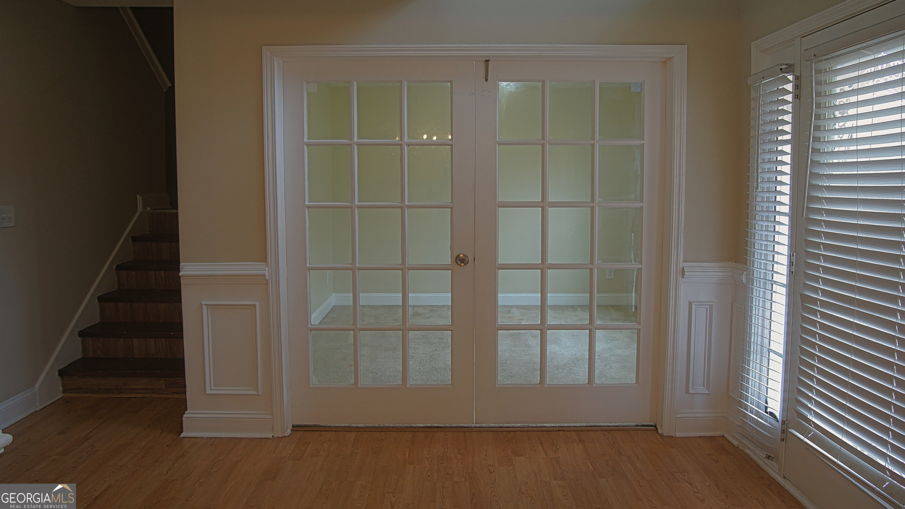 130 Stephanie Lane Covington, GA 30016 - Photo 30 of 67 an empty room with wooden floor and windows