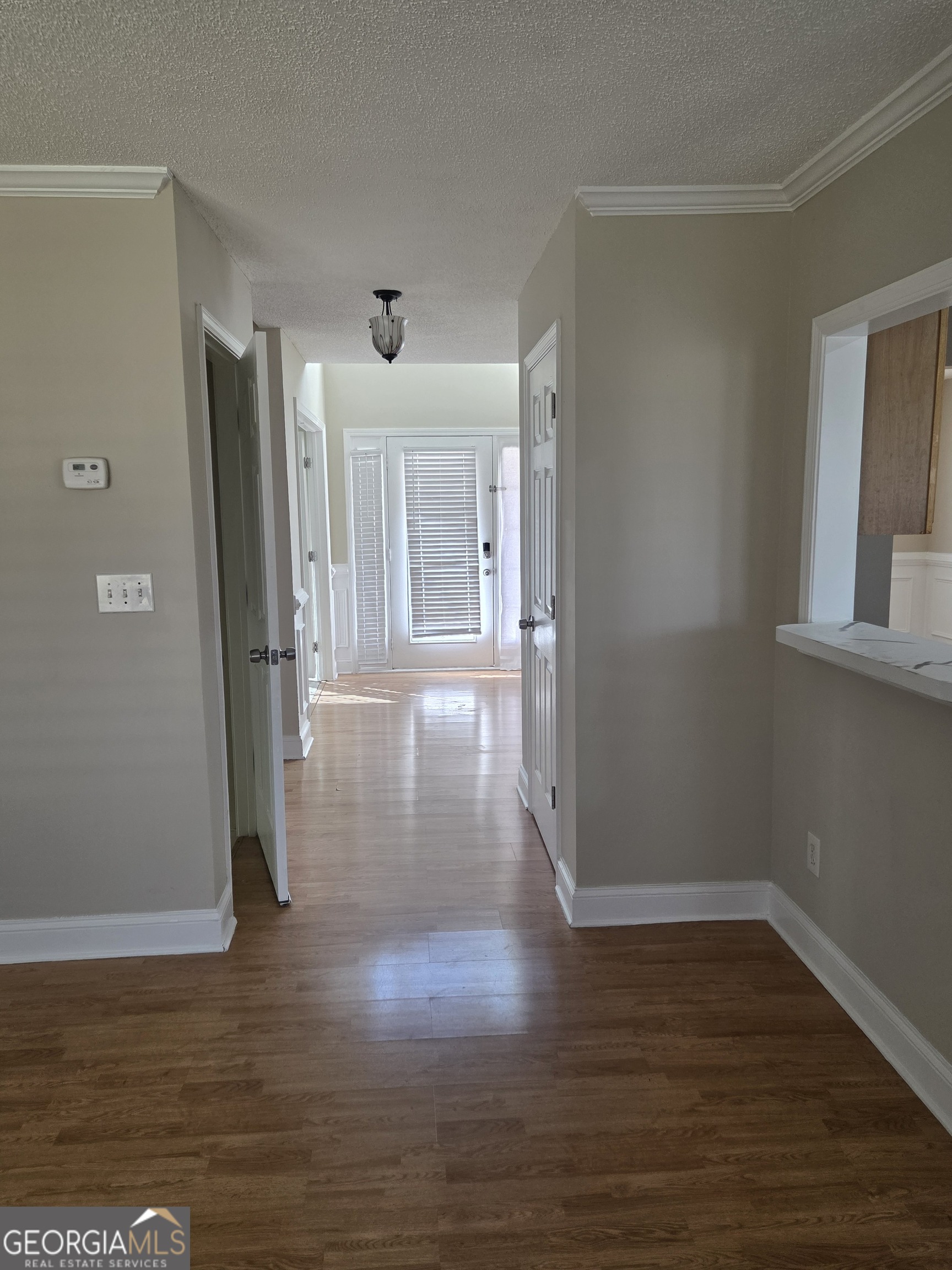 130 Stephanie Lane Covington, GA 30016 - Photo 3 of 18 a view of empty room with wooden floor
