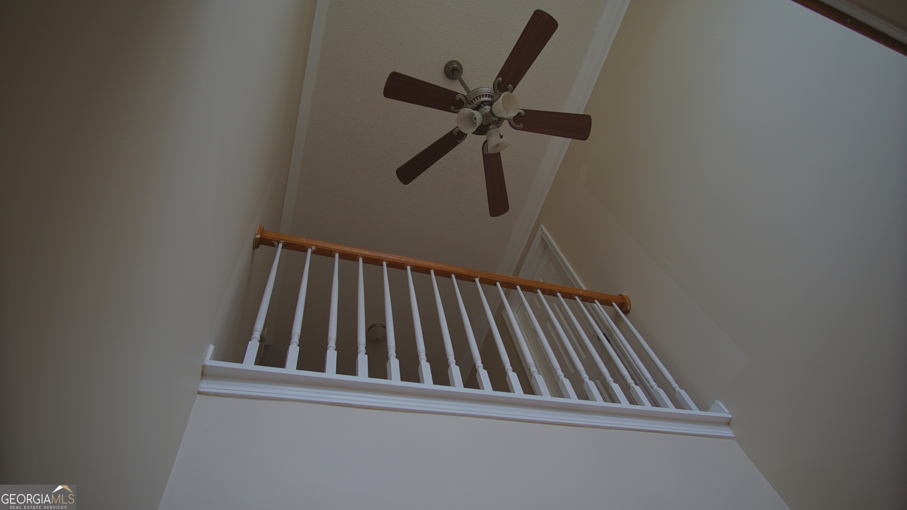 130 Stephanie Lane Covington, GA 30016 - Photo 34 of 67 a view of staircase with wooden floor