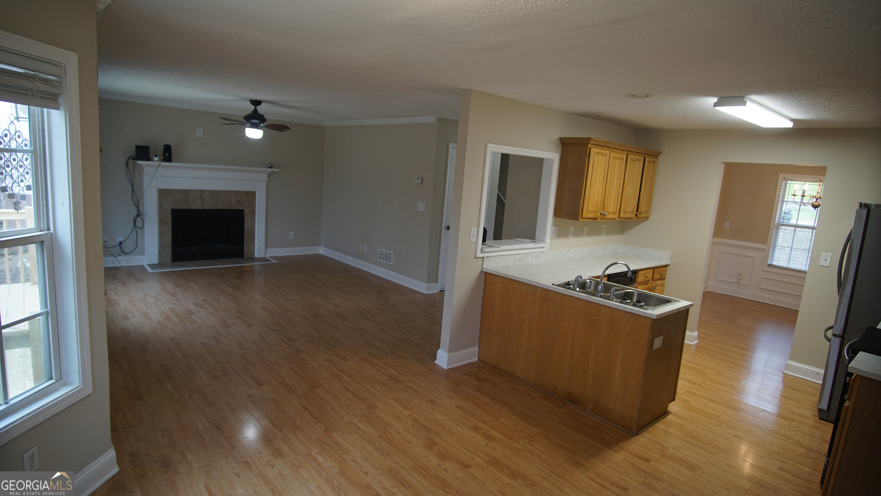 130 Stephanie Lane Covington, GA 30016 - Photo 40 of 67 a living room with furniture and a fireplace