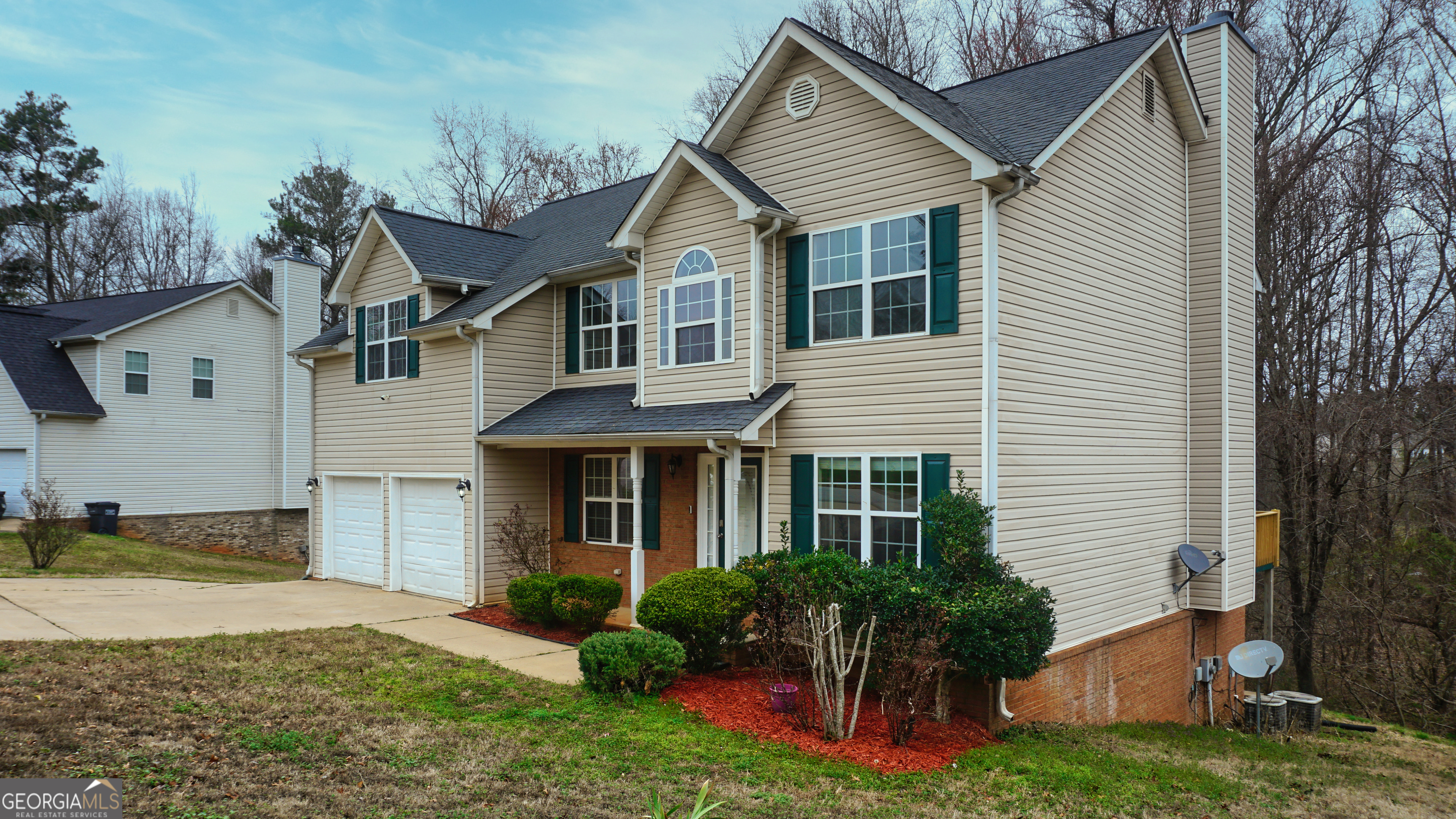 130 Stephanie Lane Covington, GA 30016 - Photo 4 of 67 a front view of a house with garden