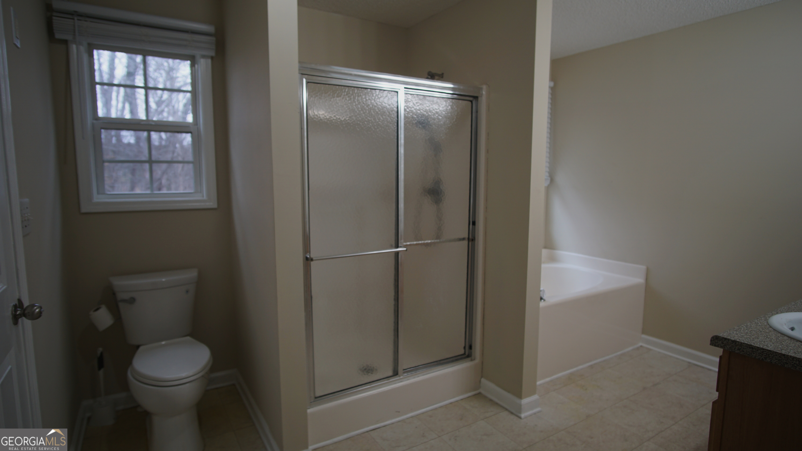 130 Stephanie Lane Covington, GA 30016 - Photo 50 of 67 a bathroom with a toilet and a sink