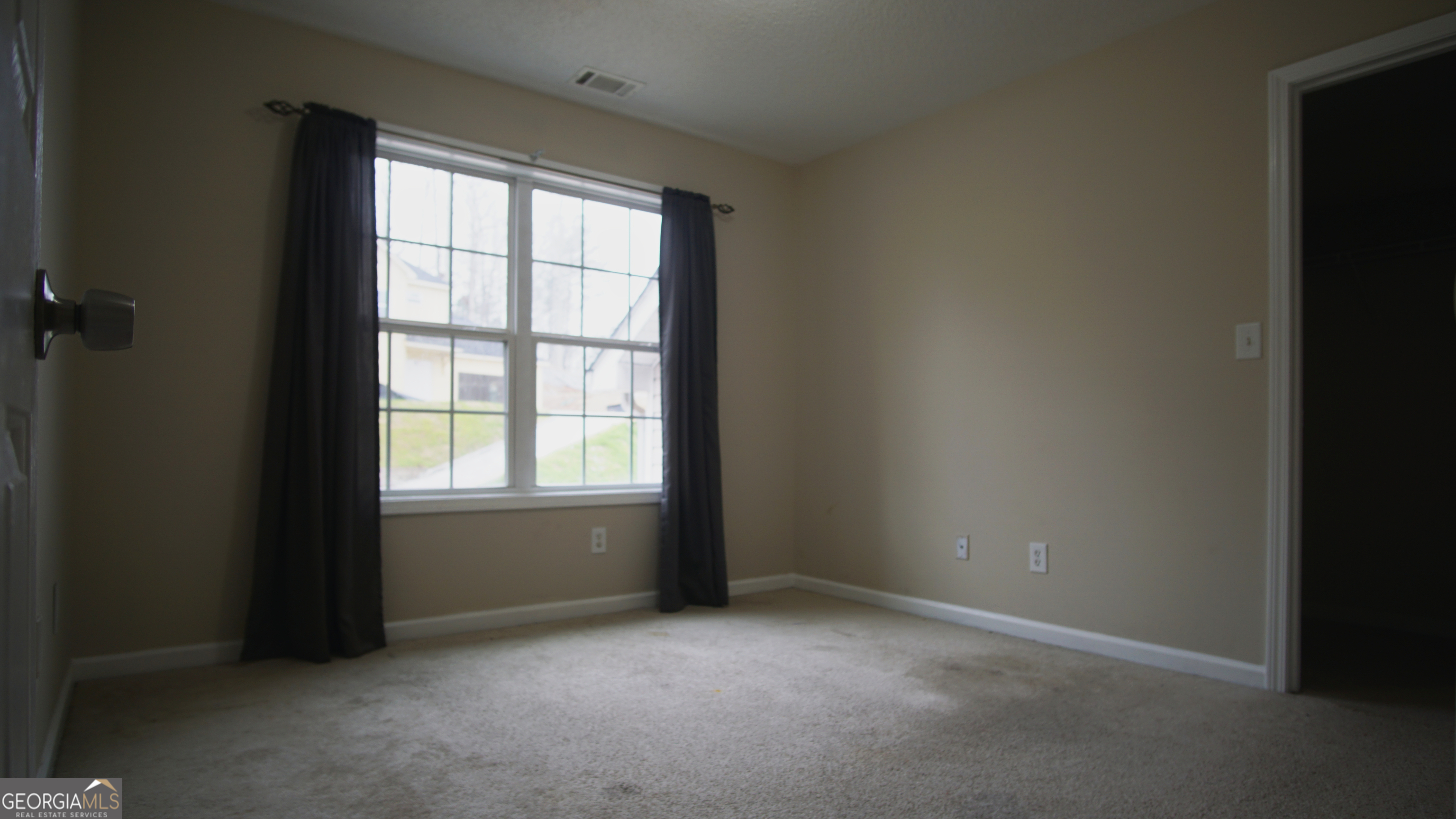 130 Stephanie Lane Covington, GA 30016 - Photo 57 of 67 an empty room with a window