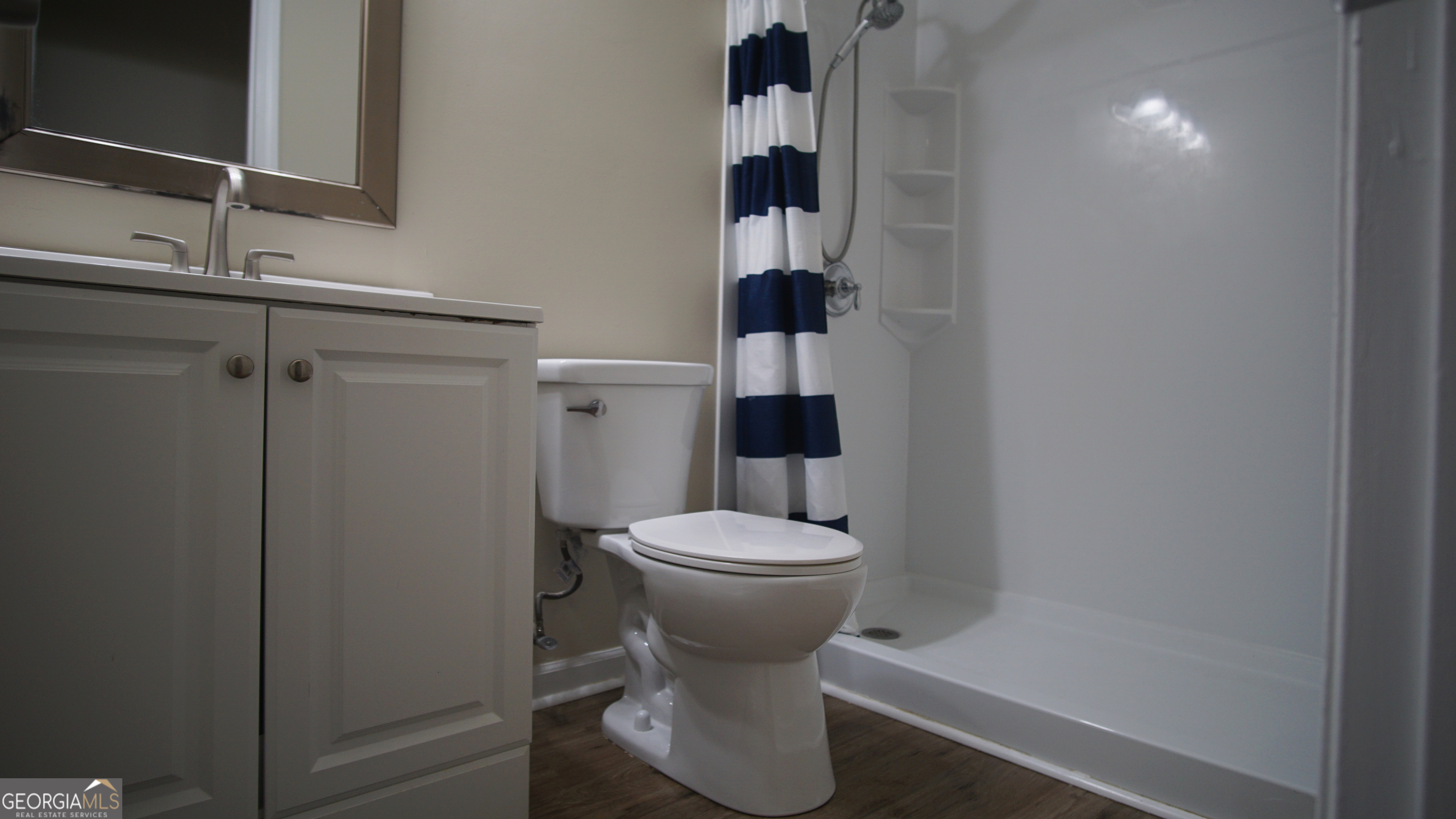 130 Stephanie Lane Covington, GA 30016 - Photo 58 of 67 a bathroom with a toilet and a sink
