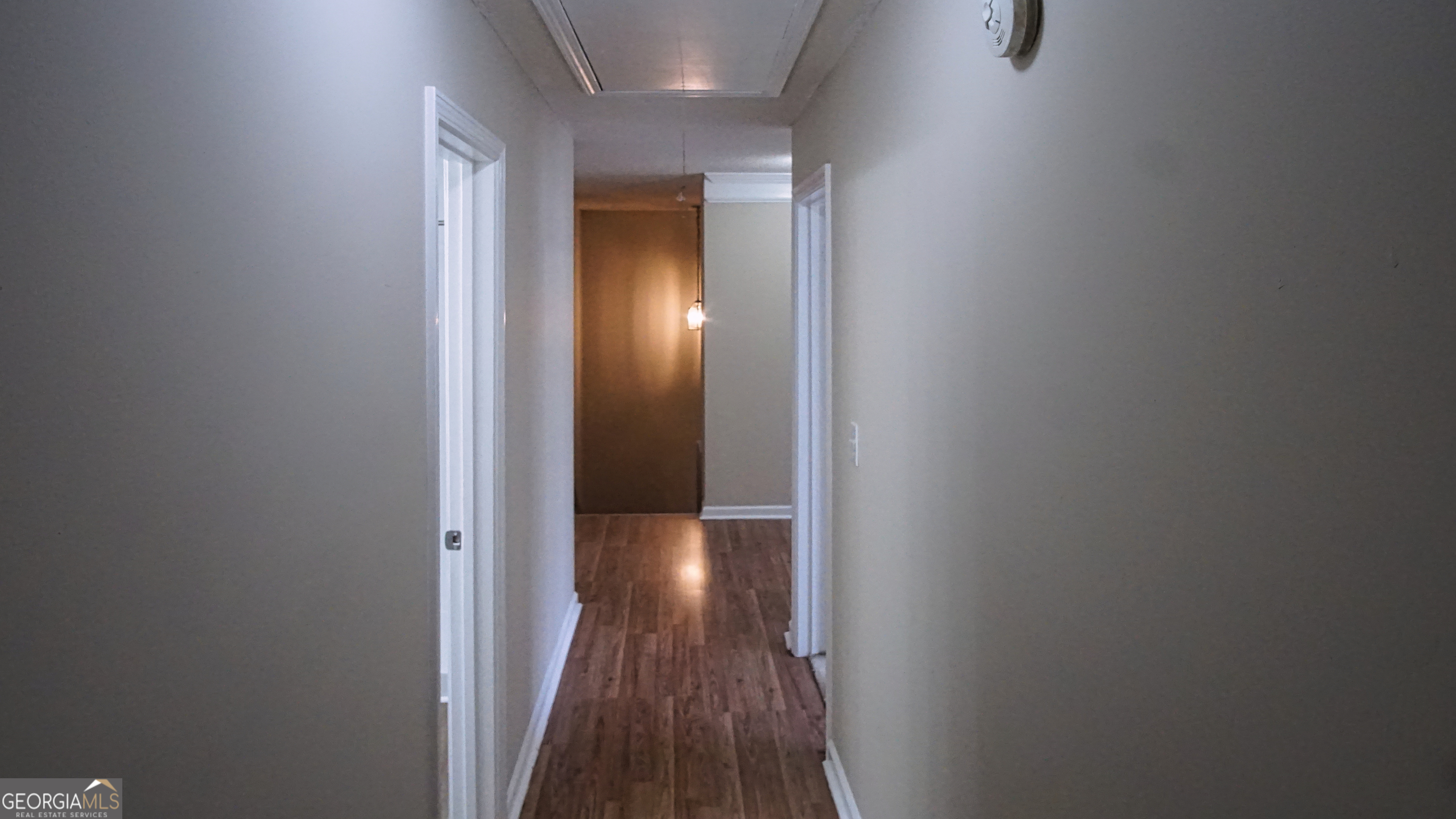 130 Stephanie Lane Covington, GA 30016 - Photo 59 of 67 a view of a hallway with wooden floor