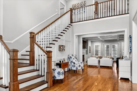 a living room with furniture and a rug