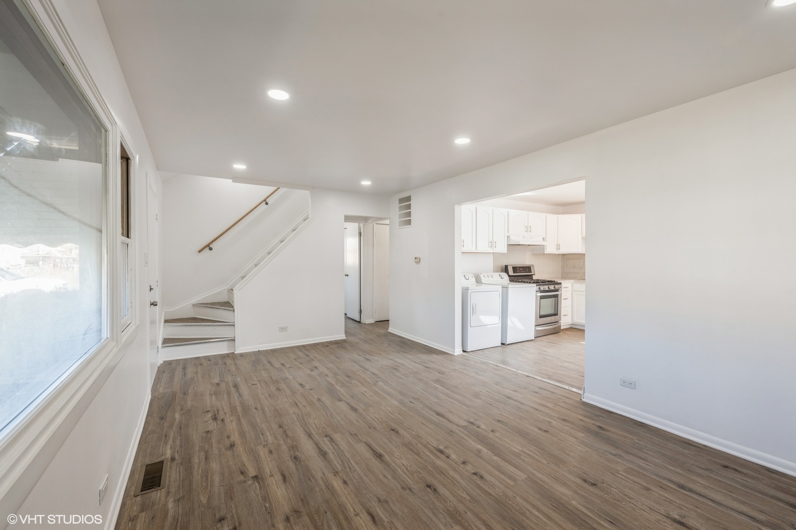 8713 Cranbrook Lane Bridgeview, IL 60455 - Photo 3 of 15 a view of a kitchen with wooden floor