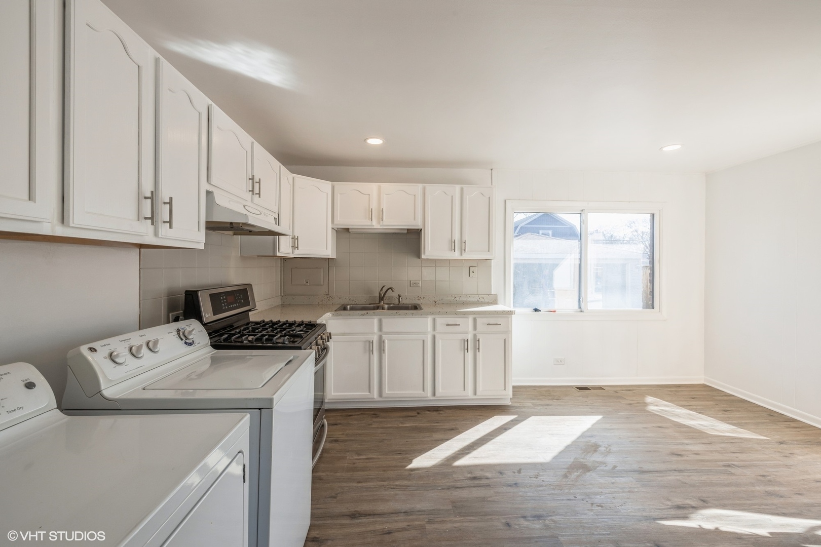 8713 Cranbrook Lane Bridgeview, IL 60455 - Photo 5 of 15 a kitchen with a cabinets and white appliances