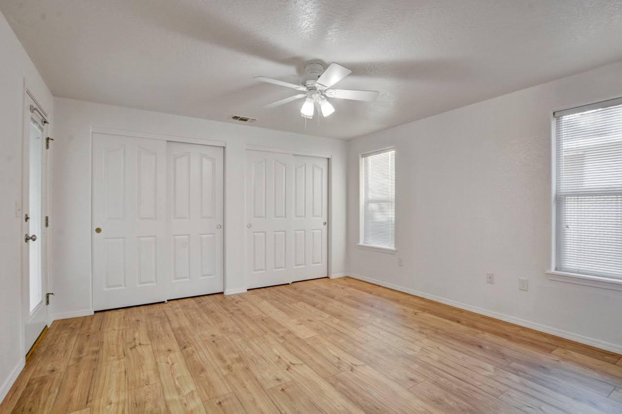 417 Crystal Drive Eagle Point, OR 97524 - Photo 16 of 35 a view of empty room with wooden floor and fan
