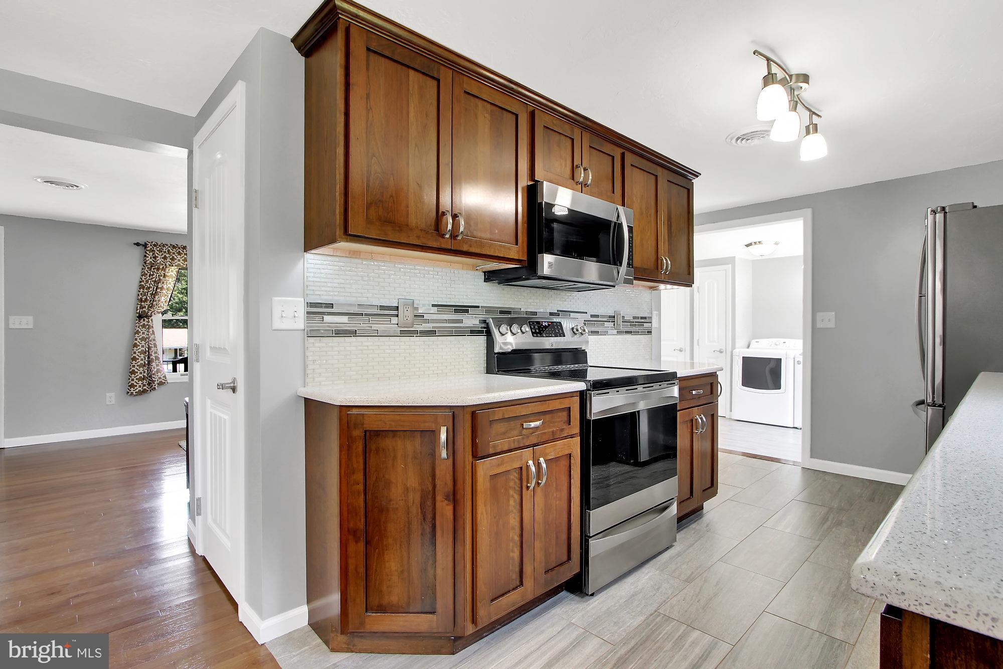 1129 Stone Road Westminster, MD 21158 - Photo 12 of 36 Custom multi color under cabinet lighting