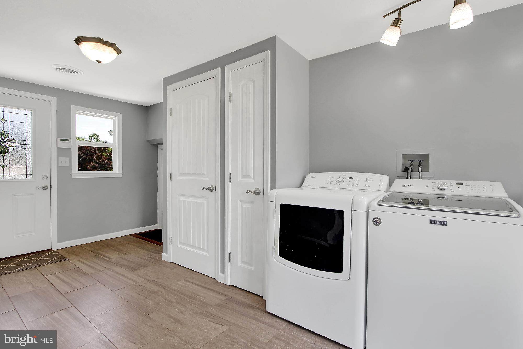 1129 Stone Road Westminster, MD 21158 - Photo 14 of 36 Main level laundry w/ heated ceramic tile floors