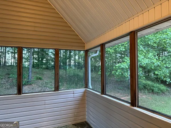 a view of a room with a large window