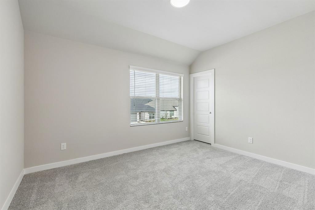 1121 Del Rio Drive Lavon, TX 75166 - Photo 23 of 32 an empty room with windows