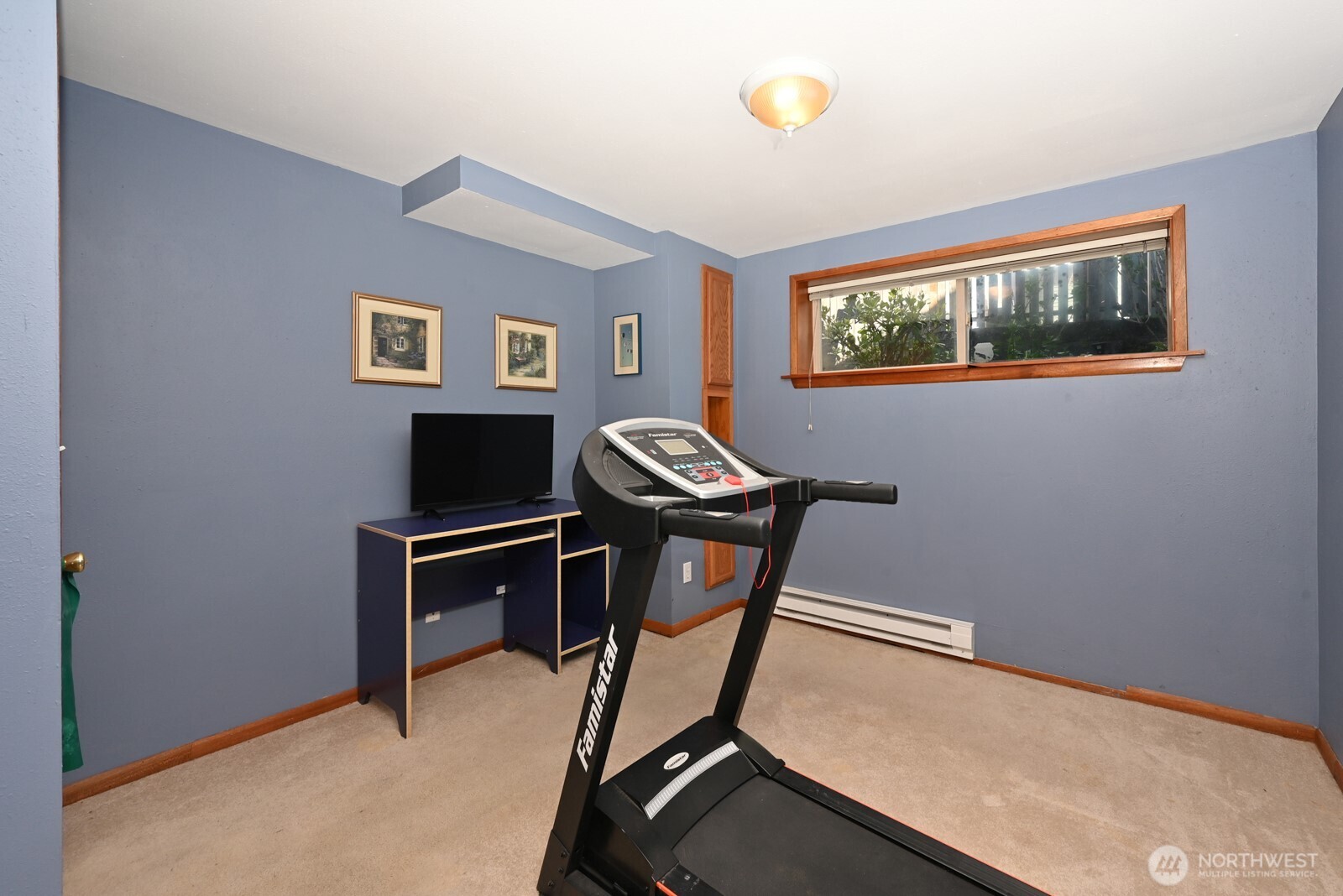 8451 40th Avenue Southwest Seattle, WA 98136 - Photo 22 of 37 a view of a workspace with furniture