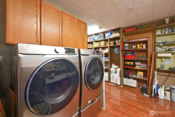 a utility room with dryer and washer