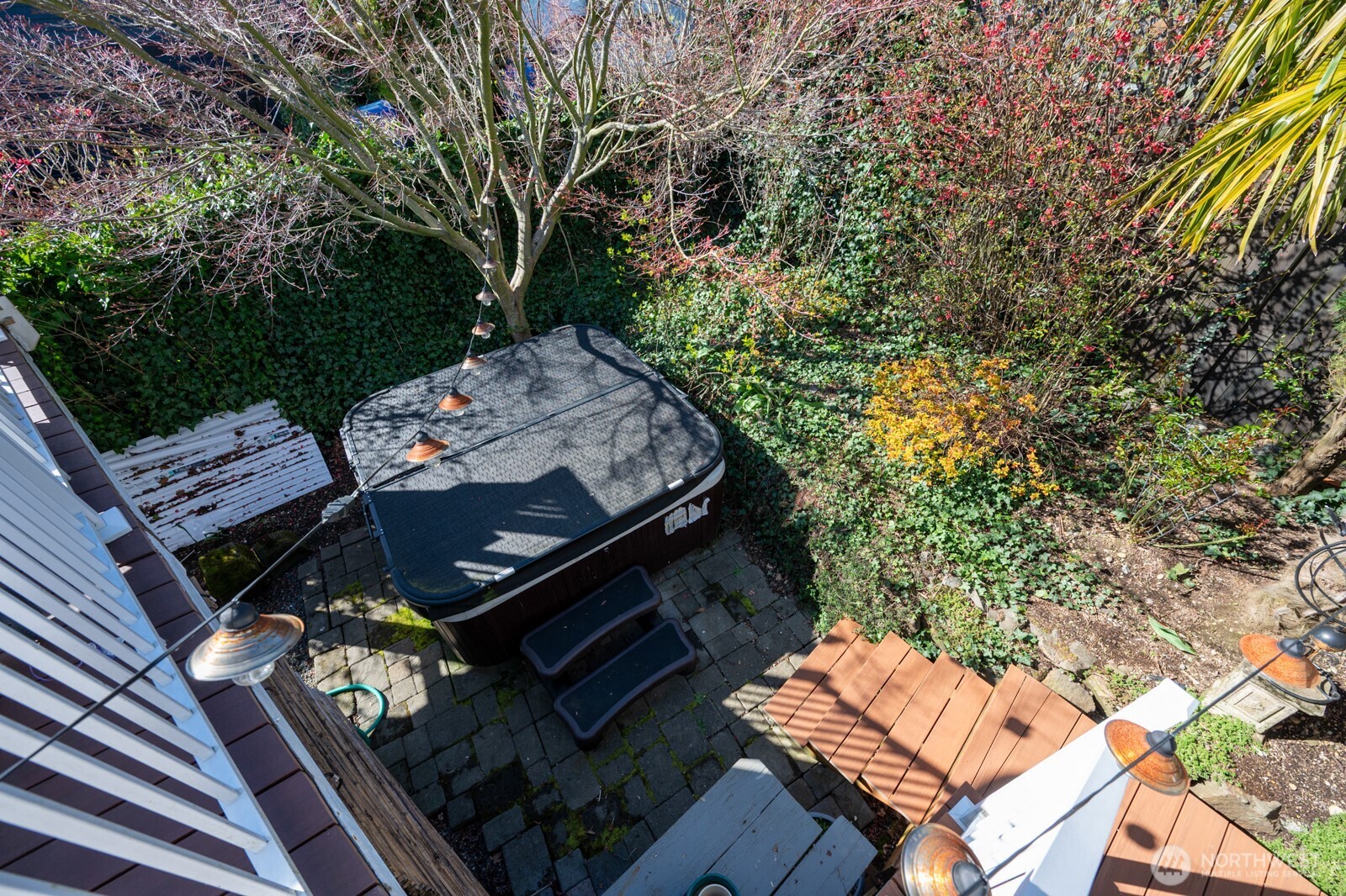 8451 40th Avenue Southwest Seattle, WA 98136 - Photo 30 of 37 an outdoor space with lounge chair