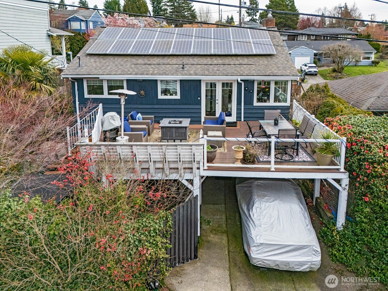 8451 40th Avenue Southwest Seattle, WA 98136 - Photo 31 of 37 a balcony with furniture and a potted plant