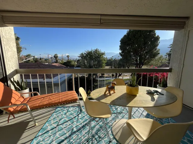 a view of a balcony dining area