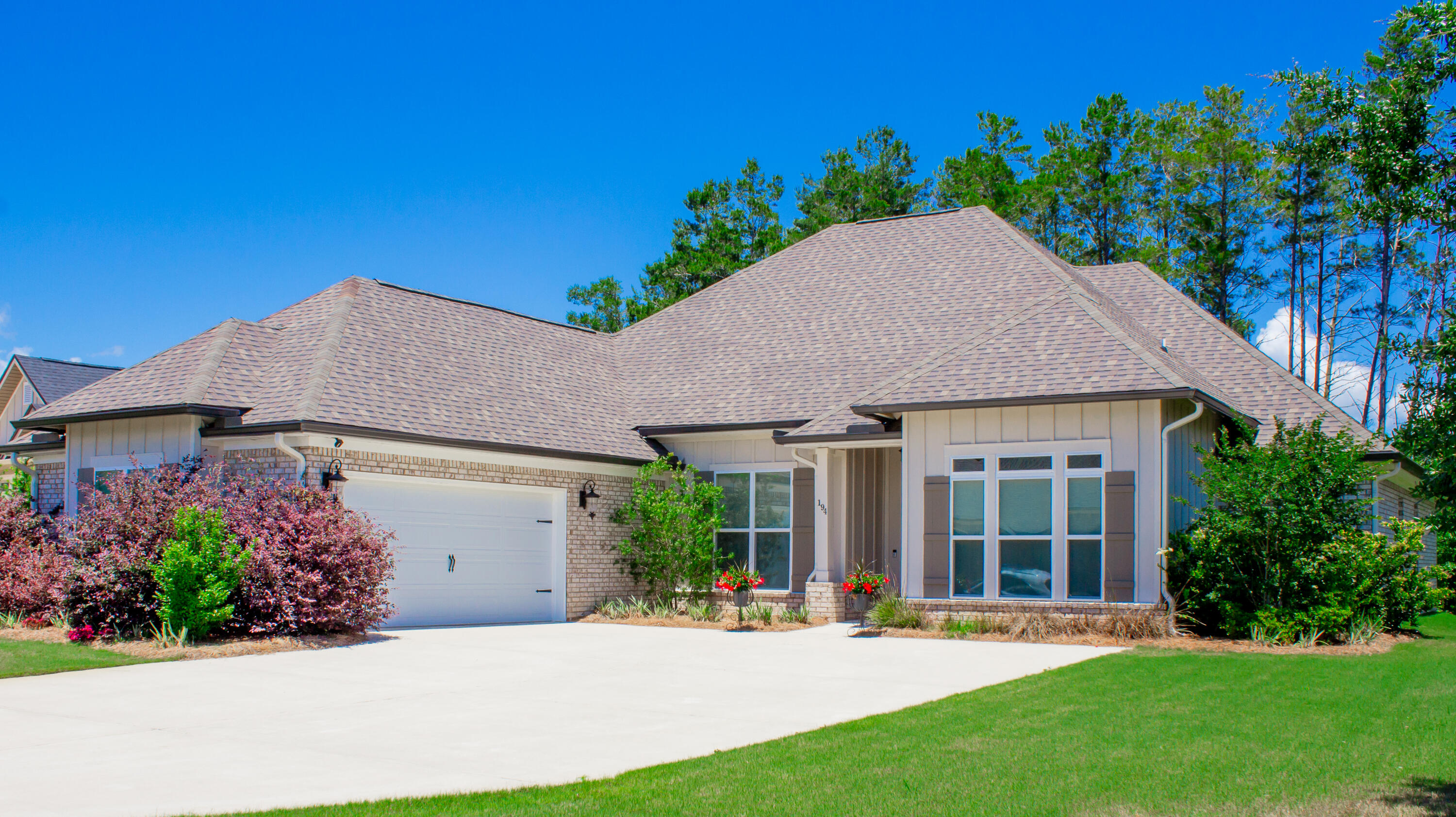 front view of a house with a yard
