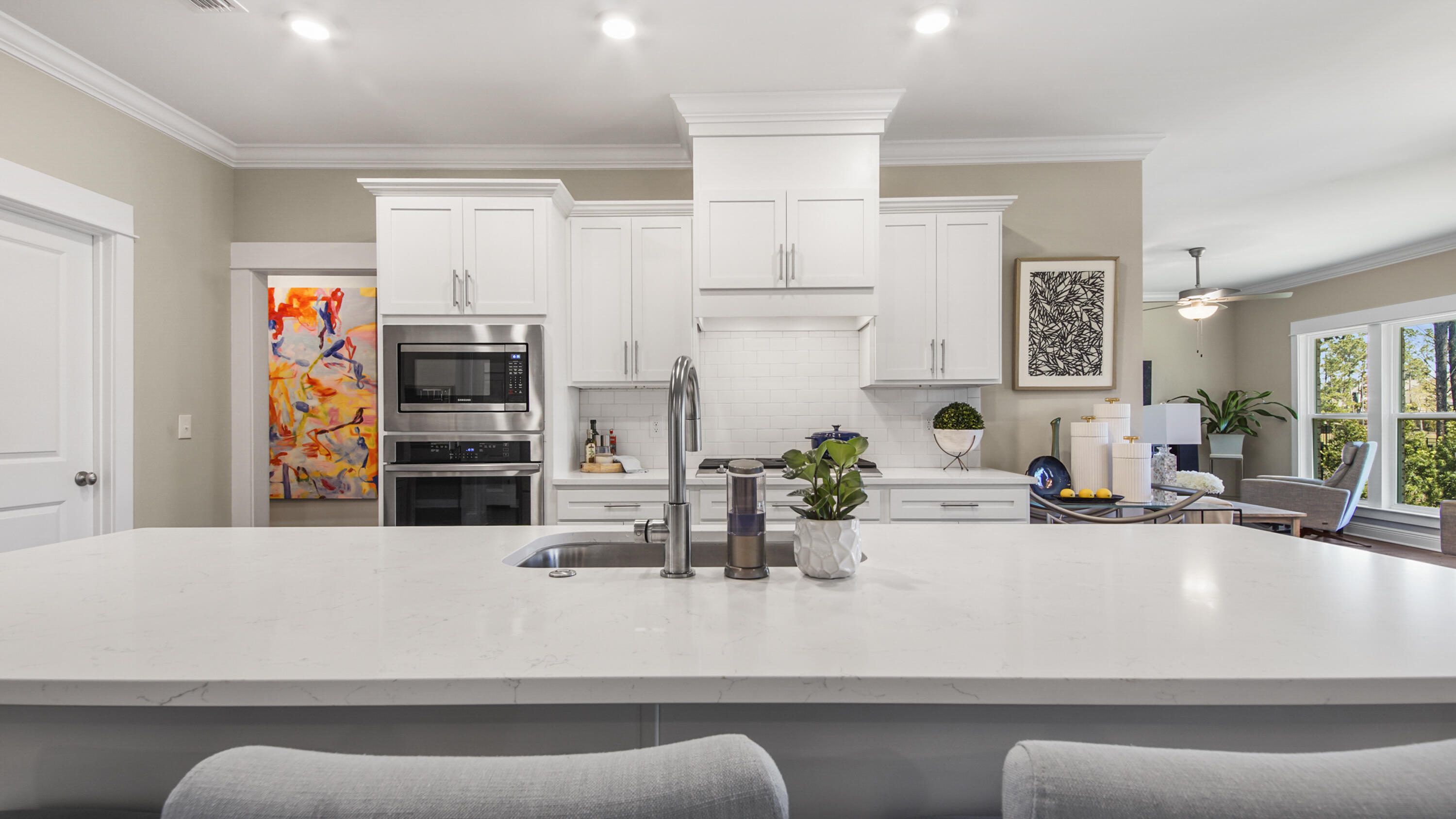194 Mill Pond Cove Freeport, FL 32439 - Photo 13 of 89 a living room with stainless steel appliances kitchen island granite countertop furniture and a view of living room