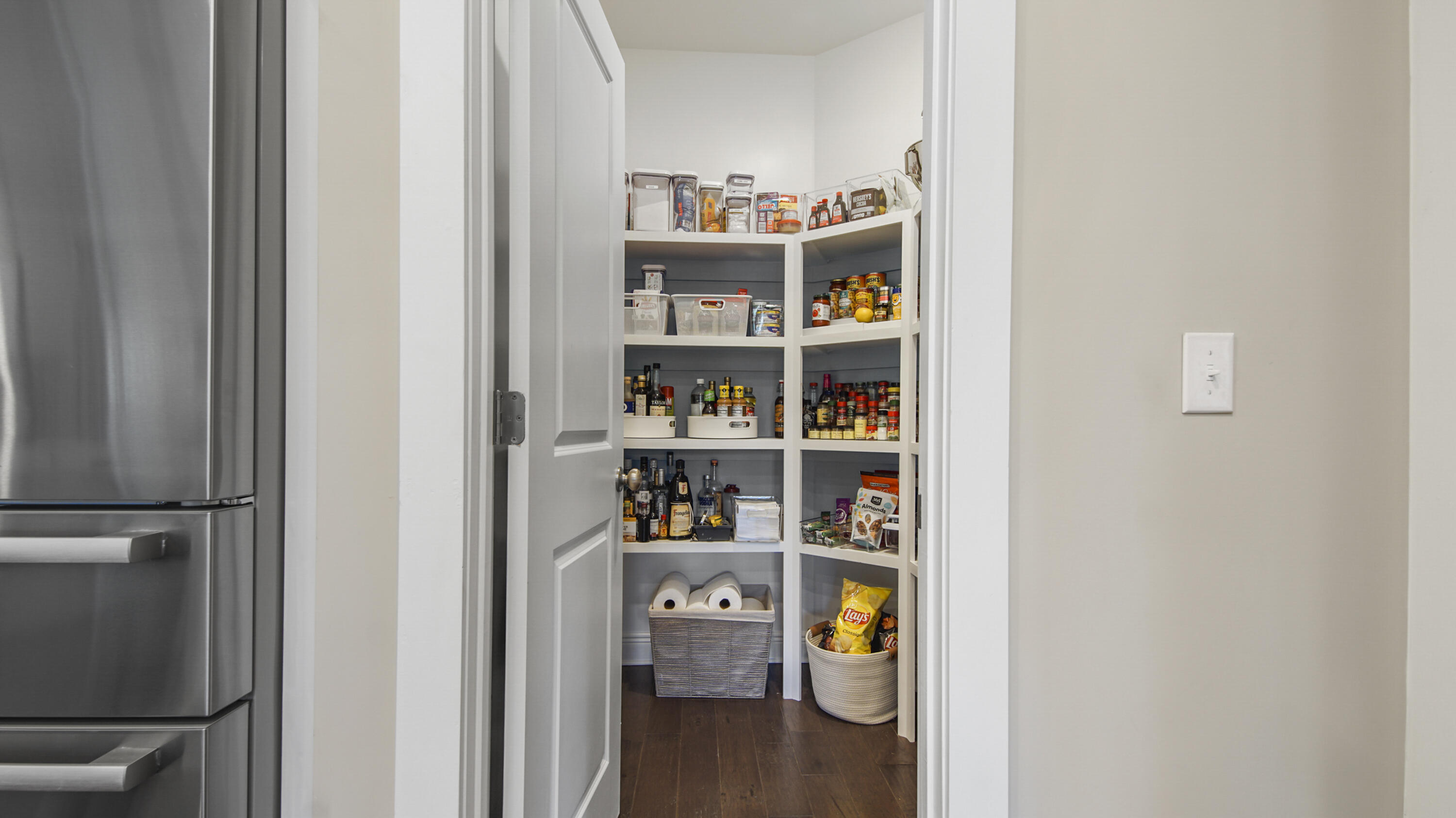 194 Mill Pond Cove Freeport, FL 32439 - Photo 19 of 89 a view of walk in closet with clothes and shoes