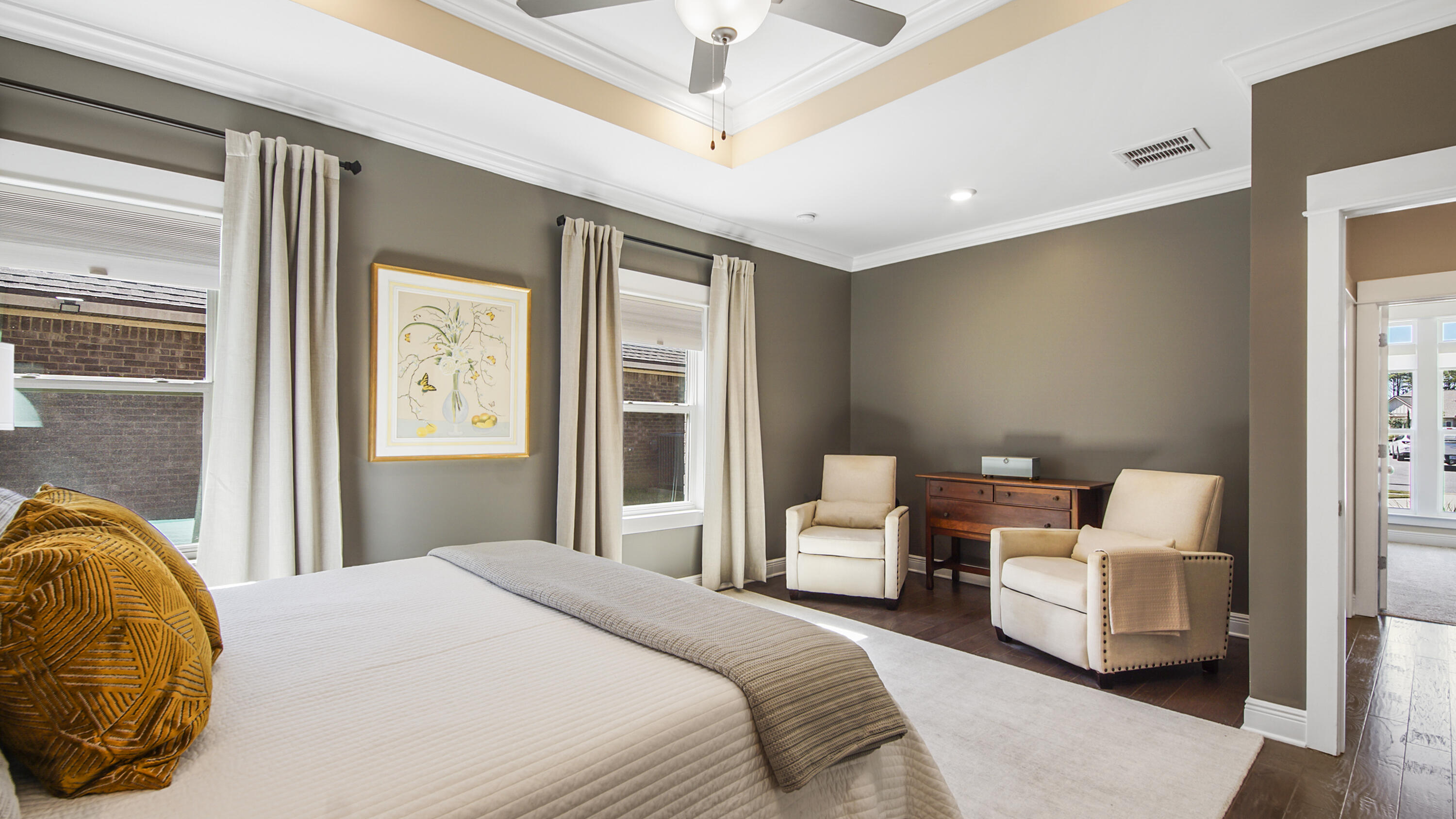 194 Mill Pond Cove Freeport, FL 32439 - Photo 21 of 89 a bedroom with a bed and wooden floor