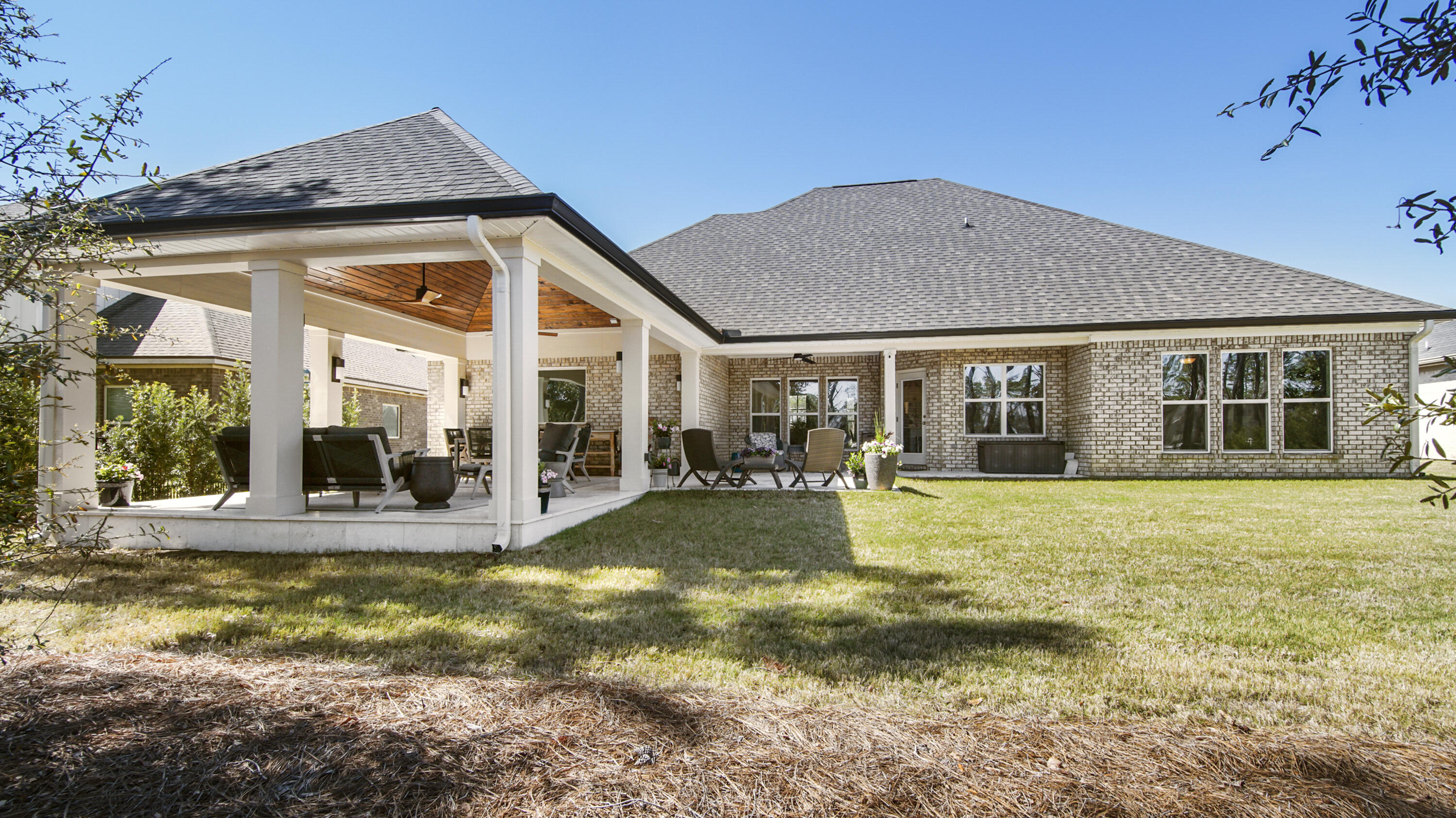 194 Mill Pond Cove Freeport, FL 32439 - Photo 46 of 89 a view of a house with pool and sitting area