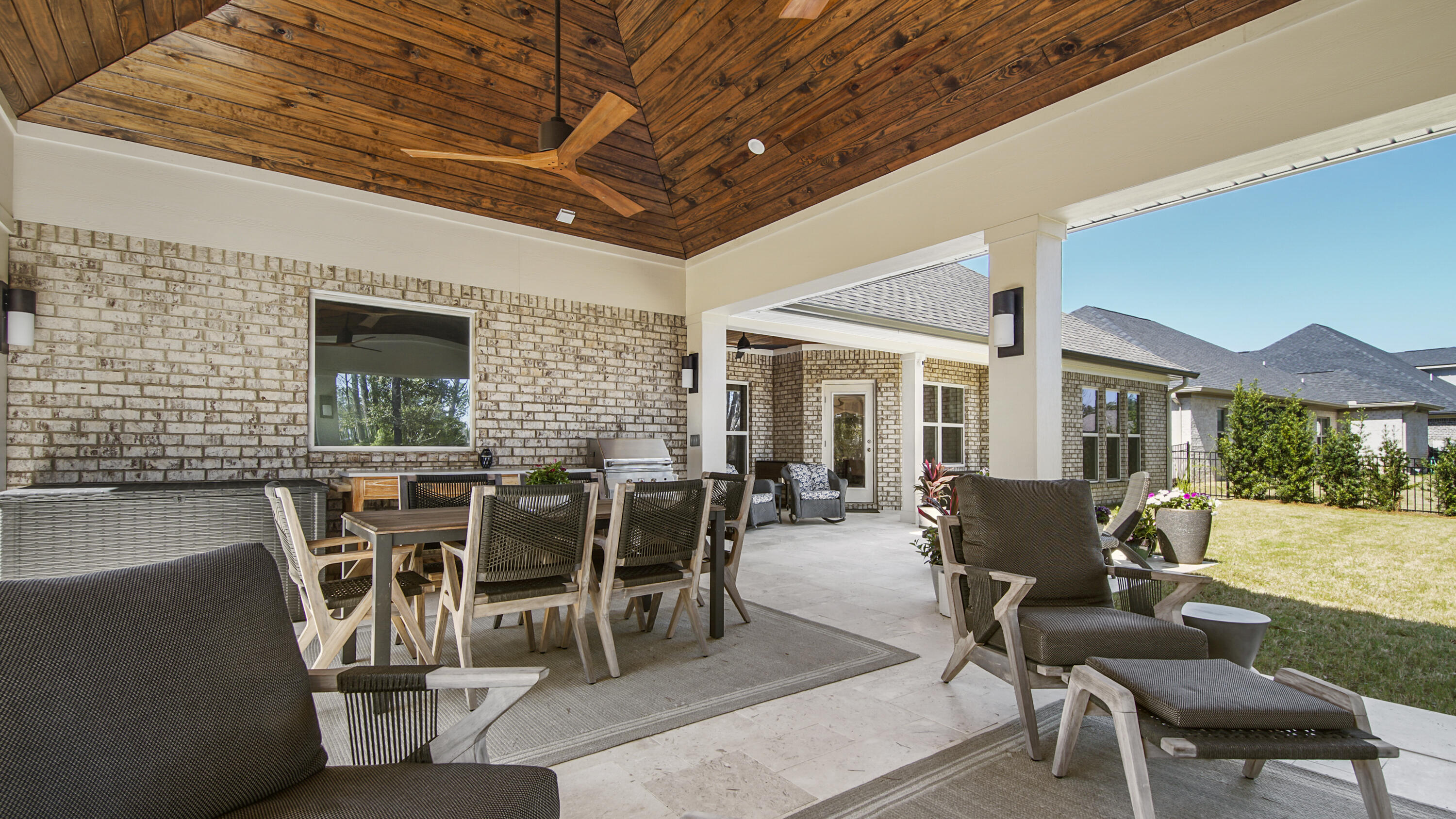 194 Mill Pond Cove Freeport, FL 32439 - Photo 47 of 89 a view of a patio with table and chairs