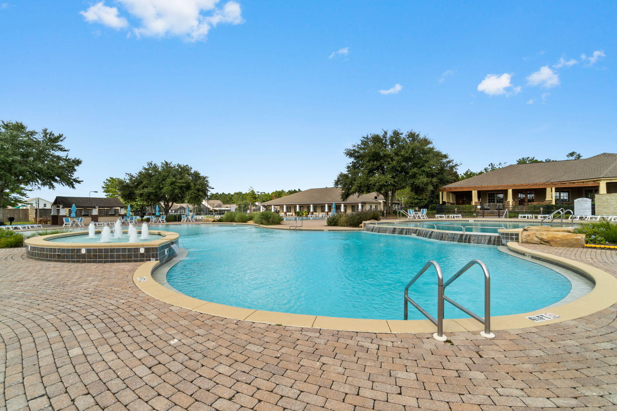 194 Mill Pond Cove Freeport, FL 32439 - Photo 66 of 89 a swimming pool with outdoor seating and yard