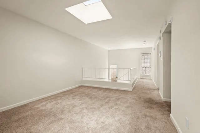 an empty room with a natural light