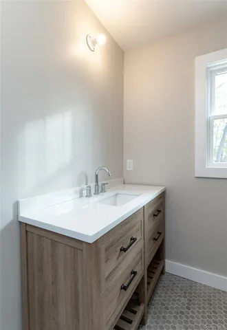 a stove top oven sitting inside of a kitchen
