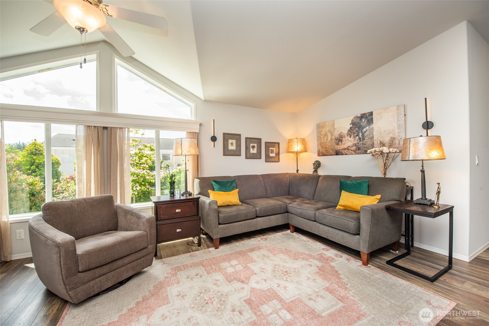 720 West Heritage Loop Sequim, WA 98382 - Photo 15 of 35 a living room with furniture and a lamp