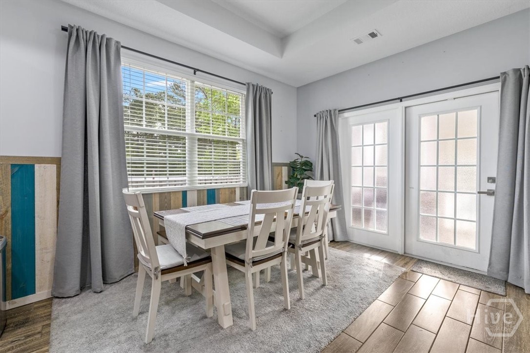 107 Buford Hill Road Eden, GA 31307 - Photo 23 of 51 DINING AREA WITH DOORS TO SCREEN PORCH