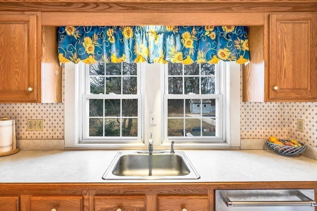 105 Hartford Street Natick, MA 01760 - Photo 17 of 41 a view of a sink and a window with garden