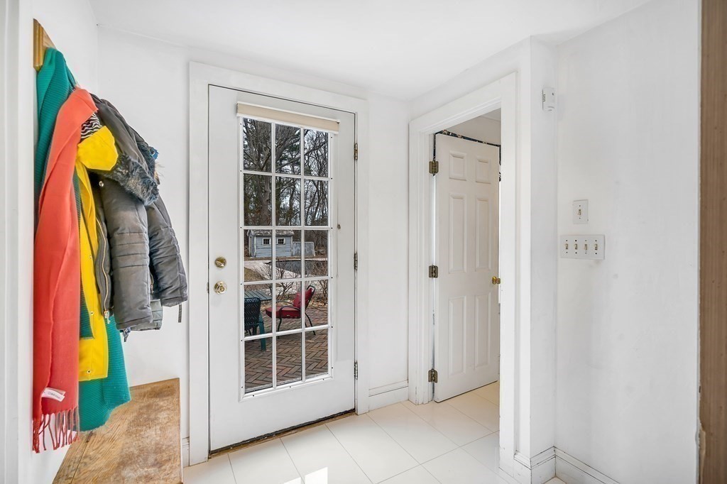 105 Hartford Street Natick, MA 01760 - Photo 37 of 41 a view of walk in closet with clothes and shoes