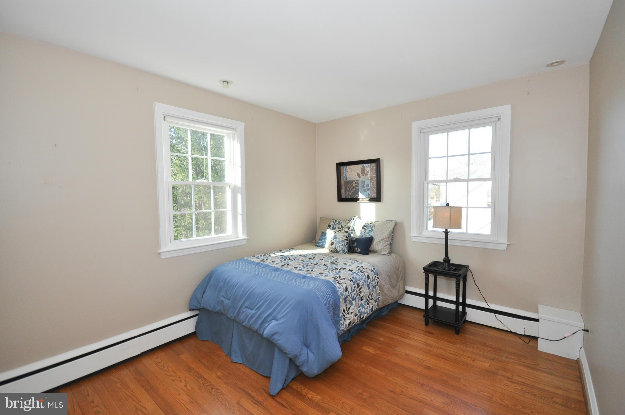409 Aigburth Road Baltimore, MD 21286 - Photo 18 of 27 a bedroom with a bed and a window