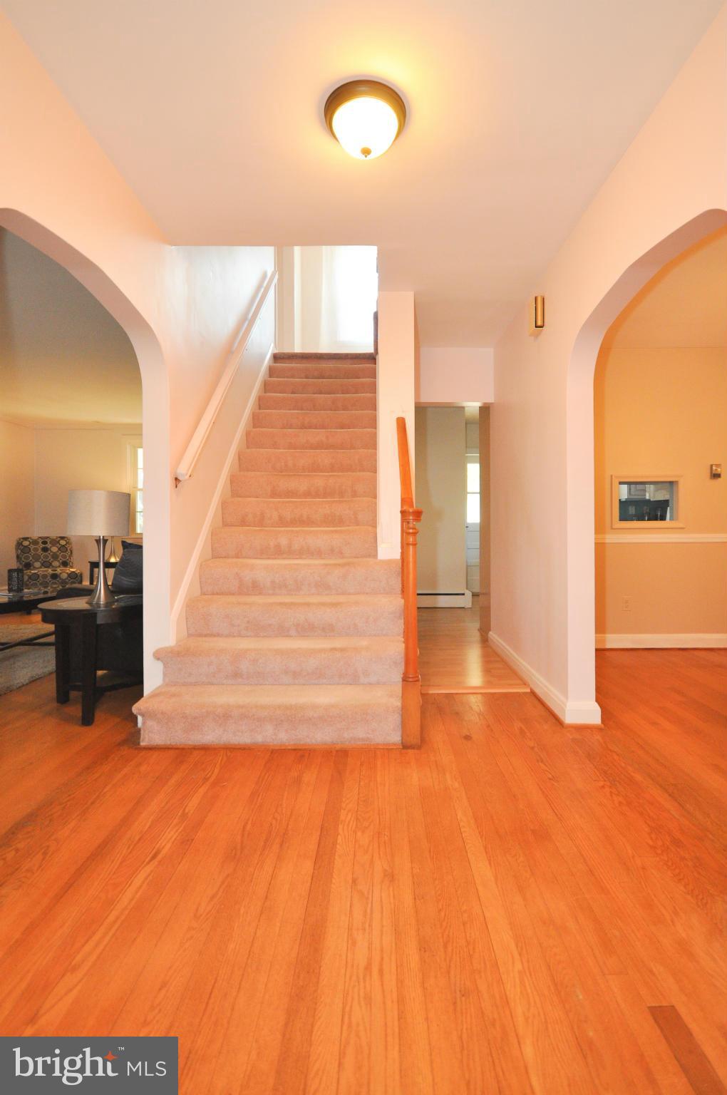 409 Aigburth Road Baltimore, MD 21286 - Photo 3 of 27 a view of a living room with a wooden floor