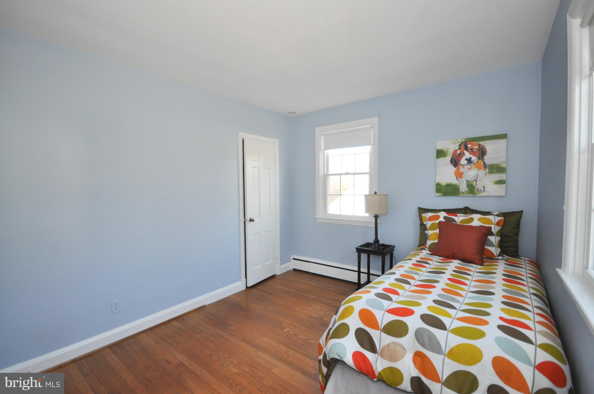 409 Aigburth Road Baltimore, MD 21286 - Photo 21 of 27 a bedroom with a bed and a window