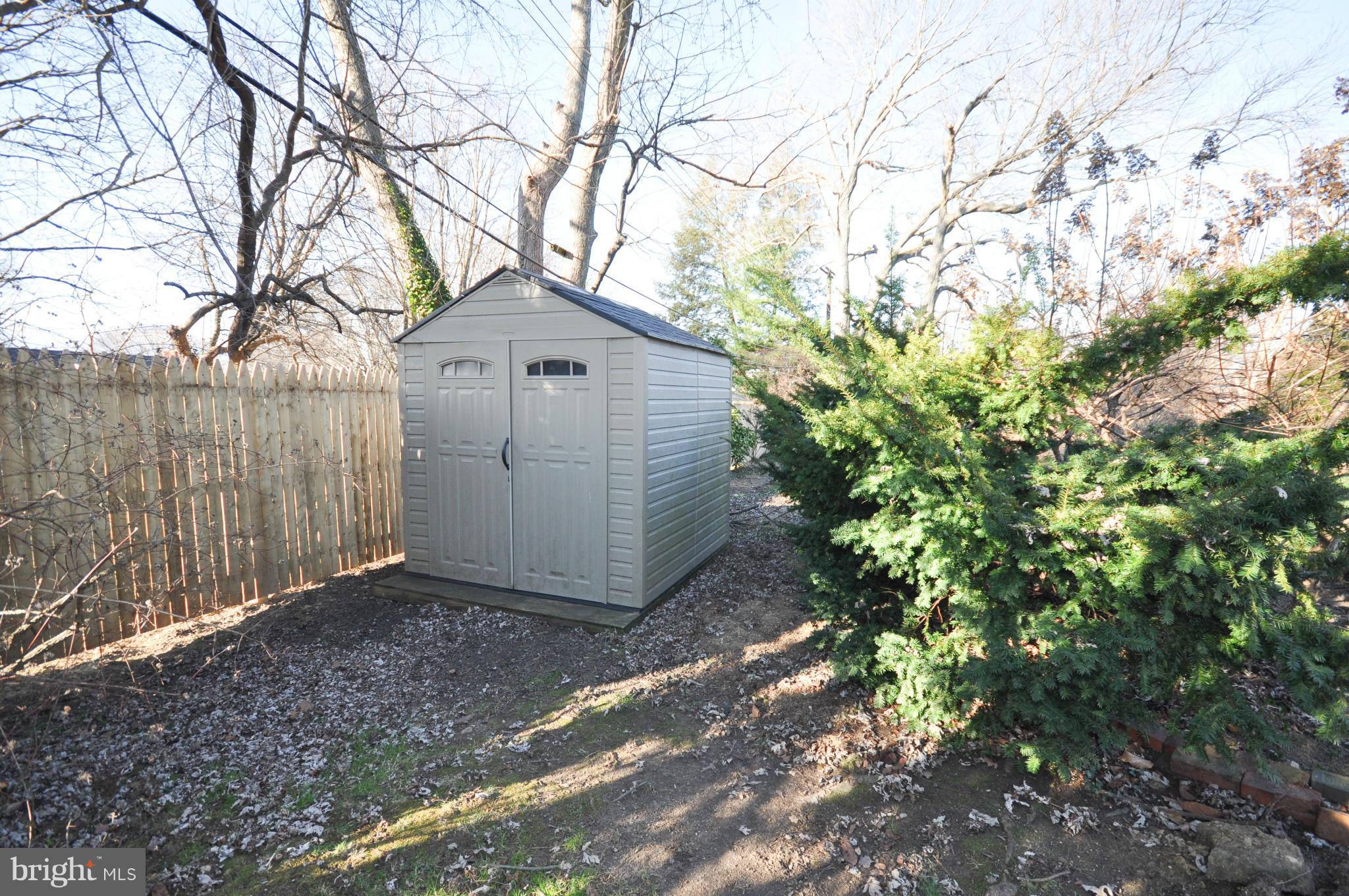409 Aigburth Road Baltimore, MD 21286 - Photo 27 of 27 a white house that has tree in front of it